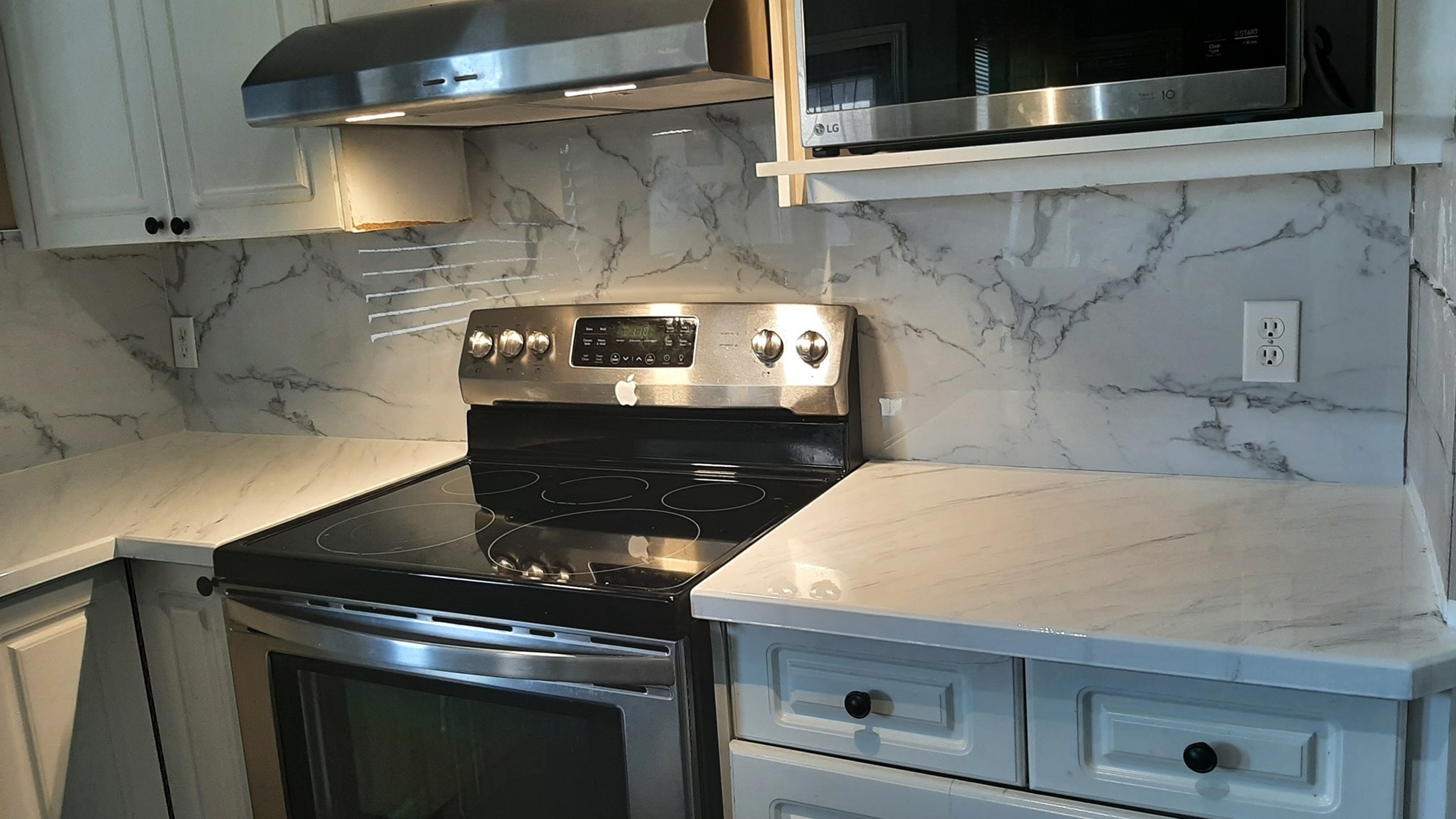 Marble-look kitchen backsplash reface Calgary