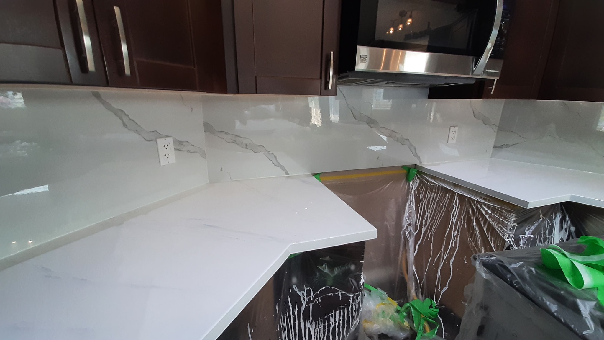 White marble-look backsplash and countertop installation Calgary