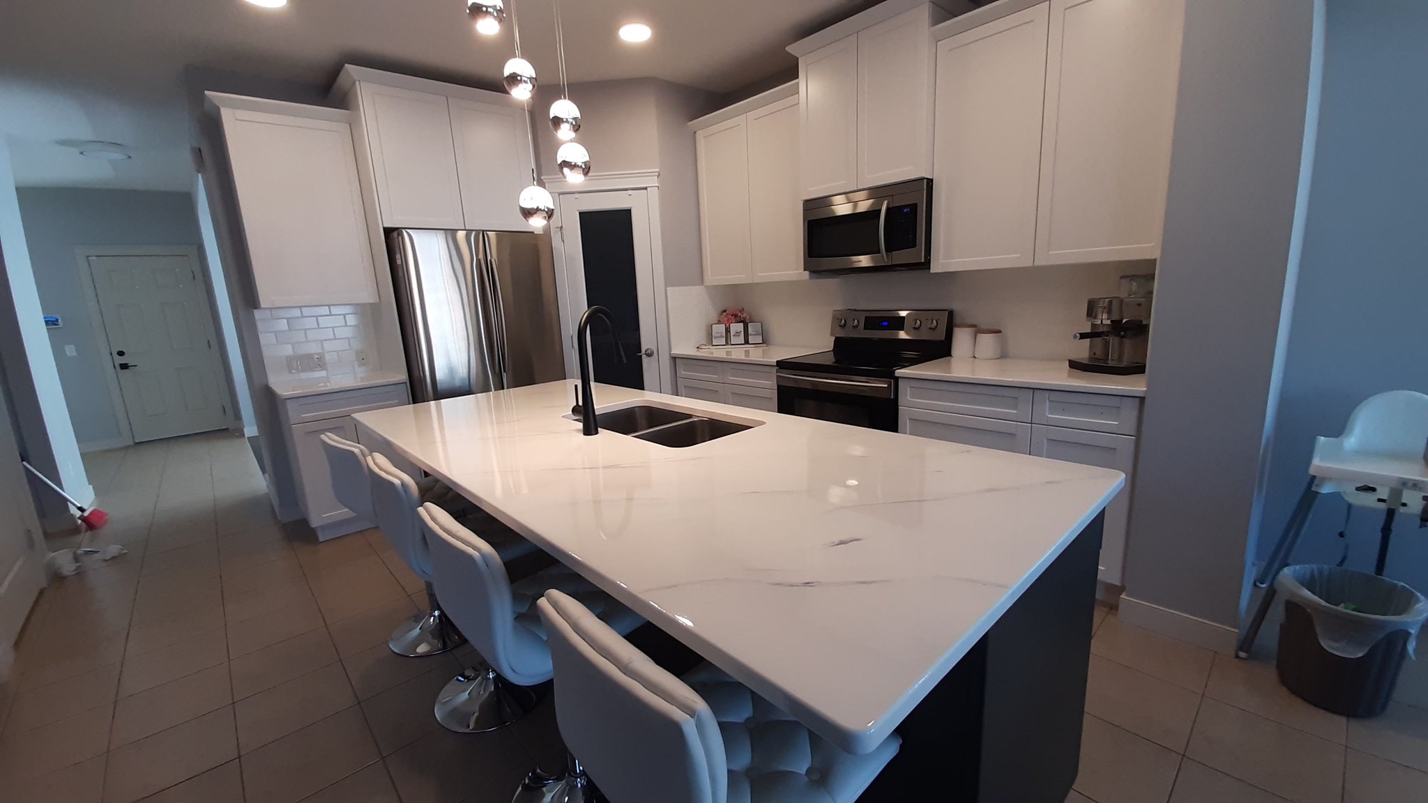 Modern white kitchen cabinet painting Calgary