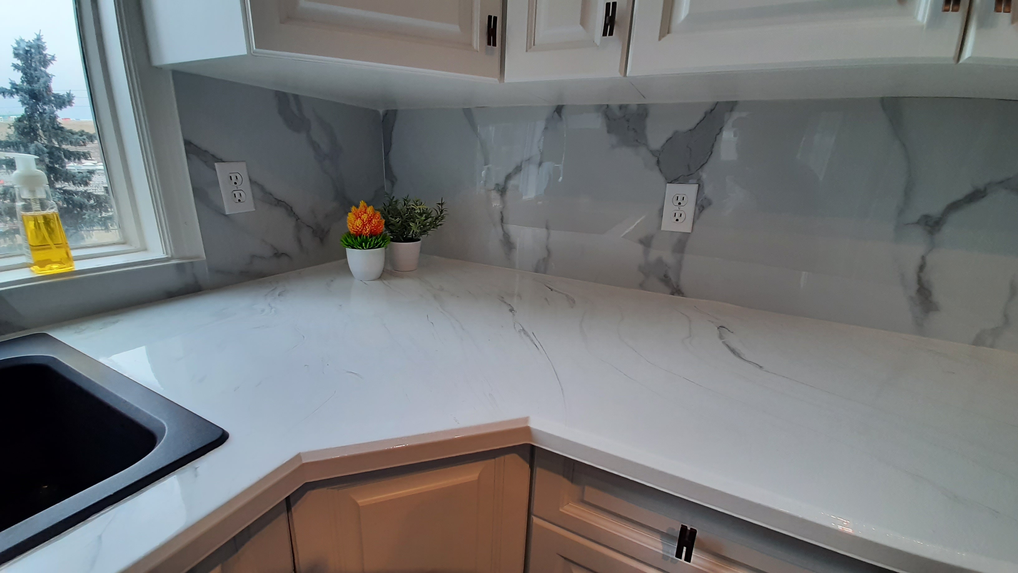 White marble-look countertop and sink island Calgary