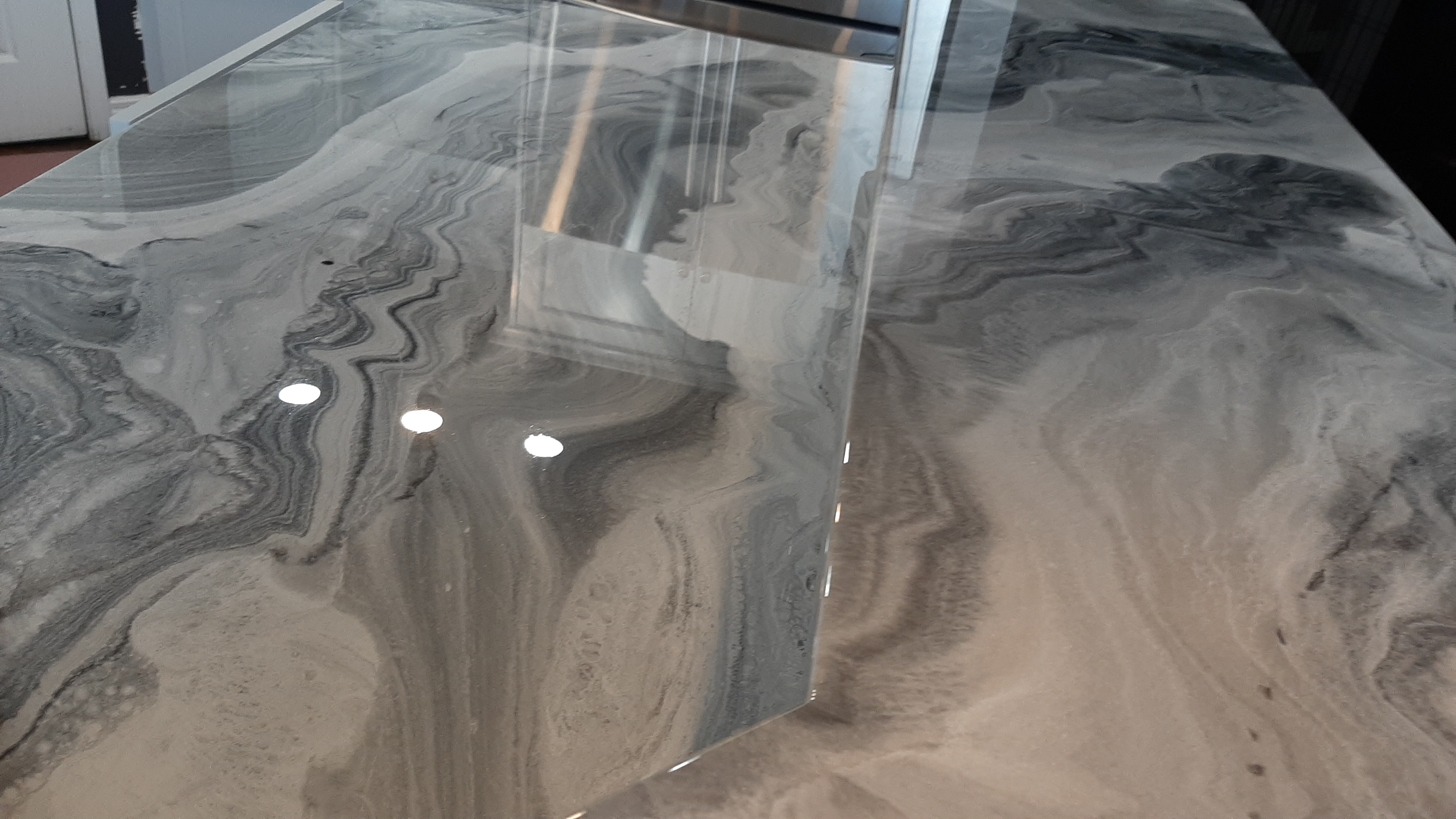 Grey marble-look epoxy countertop finish close-up Calgary