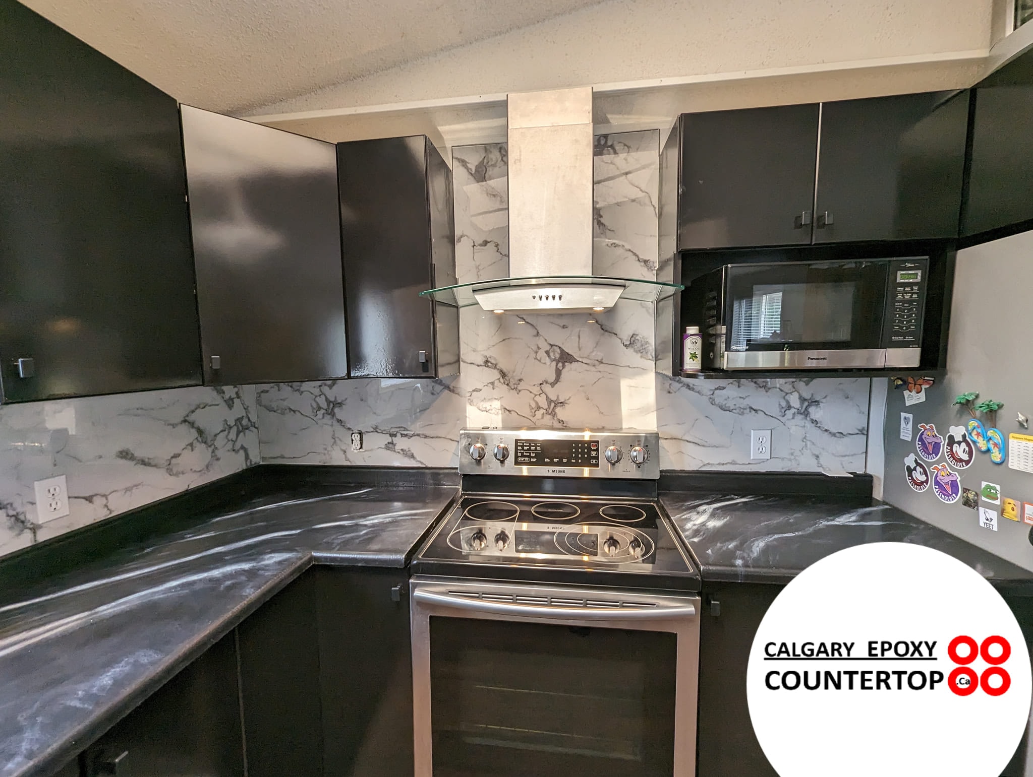 Modern seamless grout-free backsplash after refacing in Calgary kitchen